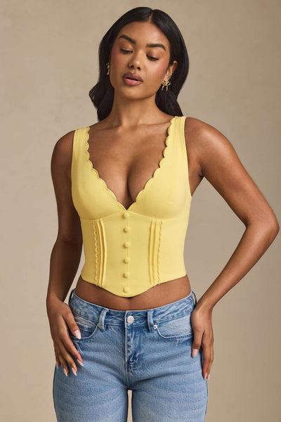 Lucia Plunge-Neck Scalloped Corset Top in Pastel Yellow