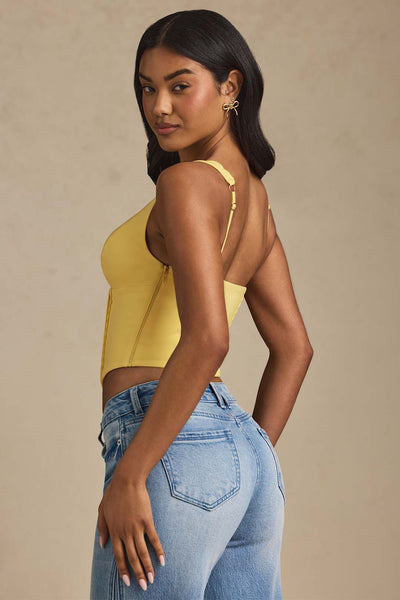 Lucia Plunge-Neck Scalloped Corset Top in Pastel Yellow