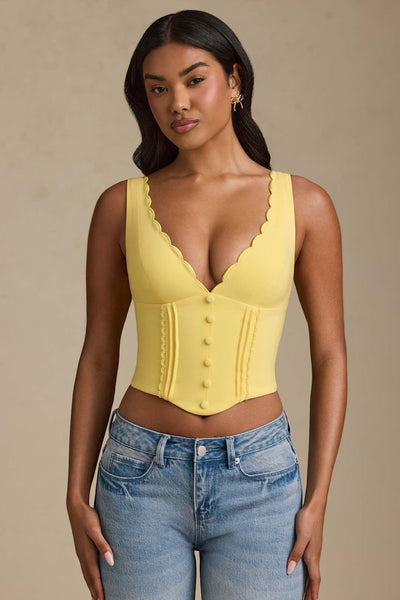 Lucia Plunge-Neck Scalloped Corset Top in Pastel Yellow